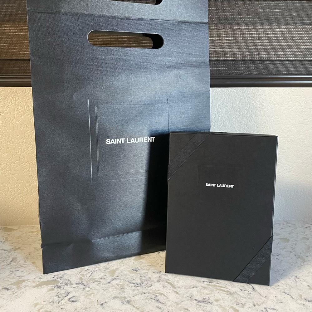 YSL black leather monogram chain strap crossbody wallet bag.